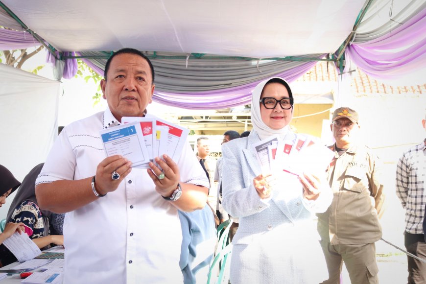 Gubernur  Arinal  Berserta Istri Nyoblos Pemilu 2024 di TPS 22 Sepang Jaya Bandar Lampung